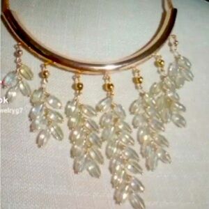 Gold colored necklace